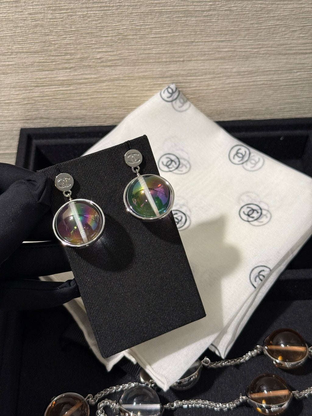 Chanel 2026 Transparent Iridescent Crystal Ball Planet Silver Button Double C Earrings